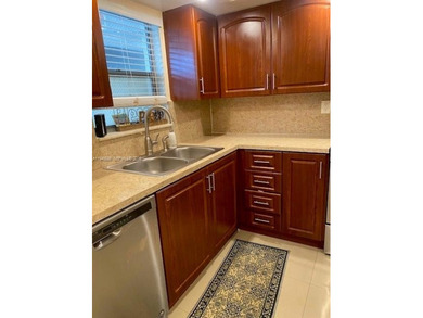 Large 2-bedroom 2-bathroom condominium on the golf course. Guard on Inverrary Country Club in Florida - for sale on GolfHomes.com, golf home, golf lot