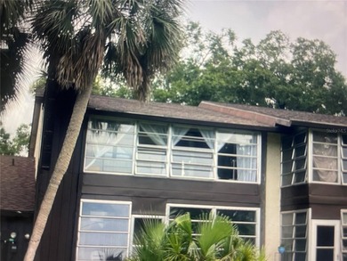 Fabulous 55+ Upstairs FURNISHED TURNKEY condo with great views on Country Club At Silver Springs Shores in Florida - for sale on GolfHomes.com, golf home, golf lot