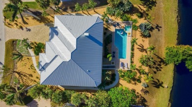 This immaculately maintained home has 3 bedrooms, 3 baths, a den on Beachview Golf Club in Florida - for sale on GolfHomes.com, golf home, golf lot