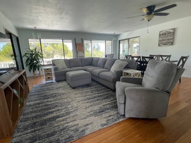 This beautiful home sits directly on the golf course in a quiet on Discovery Harbour Golf Course in Hawaii - for sale on GolfHomes.com, golf home, golf lot