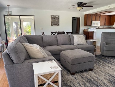 This beautiful home sits directly on the golf course in a quiet on Discovery Harbour Golf Course in Hawaii - for sale on GolfHomes.com, golf home, golf lot