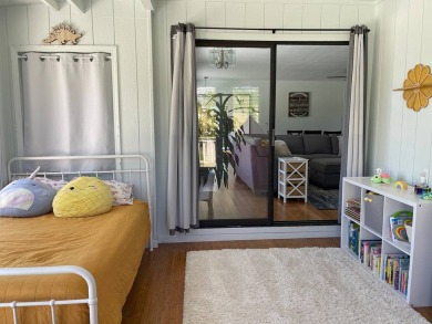This beautiful home sits directly on the golf course in a quiet on Discovery Harbour Golf Course in Hawaii - for sale on GolfHomes.com, golf home, golf lot