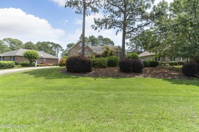 This well built, elegant home offers a unique blend of luxury on Sea Trail Golf Resort in North Carolina - for sale on GolfHomes.com, golf home, golf lot