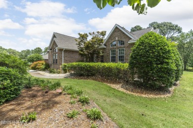 This well built, elegant home offers a unique blend of luxury on Sea Trail Golf Resort in North Carolina - for sale on GolfHomes.com, golf home, golf lot