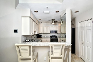 Ground floor marina-front condo puts you a few steps away from on Burnt Store Golf Club in Florida - for sale on GolfHomes.com, golf home, golf lot