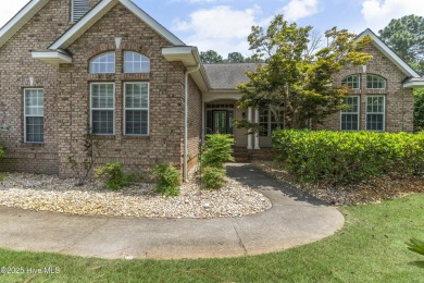 This well built, elegant home offers a unique blend of luxury on Sea Trail Golf Resort in North Carolina - for sale on GolfHomes.com, golf home, golf lot