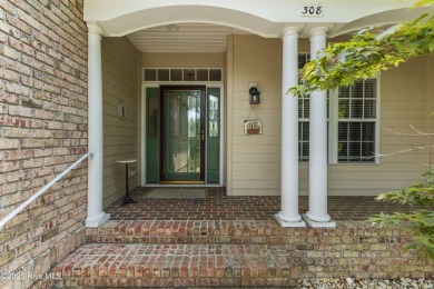 This well built, elegant home offers a unique blend of luxury on Sea Trail Golf Resort in North Carolina - for sale on GolfHomes.com, golf home, golf lot