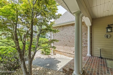 This well built, elegant home offers a unique blend of luxury on Sea Trail Golf Resort in North Carolina - for sale on GolfHomes.com, golf home, golf lot