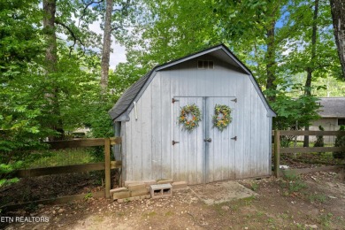 This cozy 3 bedroom/2 bath home features vinyl siding, fenced on Druid Hills Golf Club in Tennessee - for sale on GolfHomes.com, golf home, golf lot