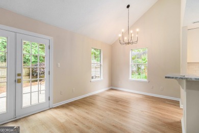 Step into this beautifully updated 3 bedroom, 2 bath on Canongate At Flat Creek Club in Georgia - for sale on GolfHomes.com, golf home, golf lot