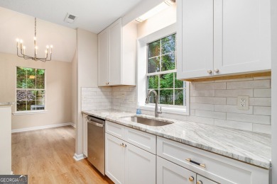 Step into this beautifully updated 3 bedroom, 2 bath on Canongate At Flat Creek Club in Georgia - for sale on GolfHomes.com, golf home, golf lot