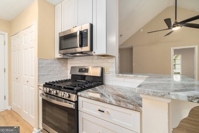 Step into this beautifully updated 3 bedroom, 2 bath on Canongate At Flat Creek Club in Georgia - for sale on GolfHomes.com, golf home, golf lot