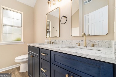 Step into this beautifully updated 3 bedroom, 2 bath on Canongate At Flat Creek Club in Georgia - for sale on GolfHomes.com, golf home, golf lot