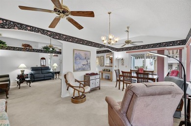 Welcome to this FANTASTIC, TURNKEY 2/2 CUSTOM DESIGNER with on El Diablo Executive Golf Course in Florida - for sale on GolfHomes.com, golf home, golf lot