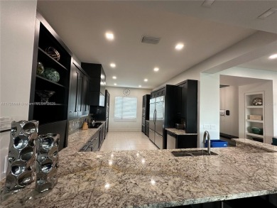 Top-notch luxury home construction. A turnkey, three-story on ChampionsGate Golf Resort in Florida - for sale on GolfHomes.com, golf home, golf lot