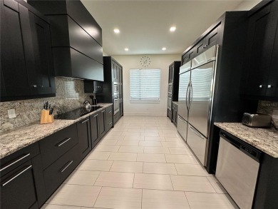 Top-notch luxury home construction. A turnkey, three-story on ChampionsGate Golf Resort in Florida - for sale on GolfHomes.com, golf home, golf lot