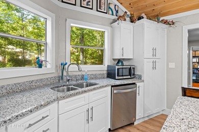 Step into spring in this warm and inviting one-level home on Druid Hills Golf Club in Tennessee - for sale on GolfHomes.com, golf home, golf lot