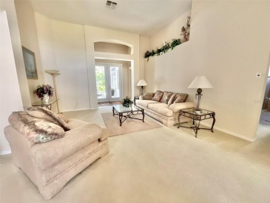 Welcome to this marvelous 4-bedroom, 3-bathroom home! Featuring on Ridgewood Lakes Golf and Country Club in Florida - for sale on GolfHomes.com, golf home, golf lot