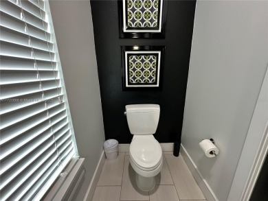 Top-notch luxury home construction. A turnkey, three-story on ChampionsGate Golf Resort in Florida - for sale on GolfHomes.com, golf home, golf lot
