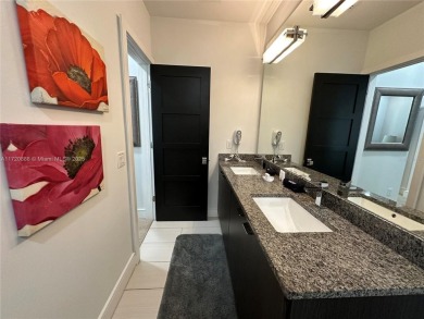 Top-notch luxury home construction. A turnkey, three-story on ChampionsGate Golf Resort in Florida - for sale on GolfHomes.com, golf home, golf lot