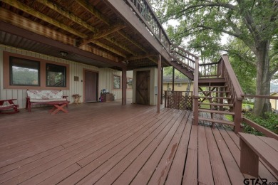 Nestled in the serene community of Hideaway Lake, this charming on Hide-A-Way Lake Golf Course in Texas - for sale on GolfHomes.com, golf home, golf lot