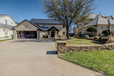 Step into this light-filled home with sweeping views of Possum on The Cliffs Resort in Texas - for sale on GolfHomes.com, golf home, golf lot
