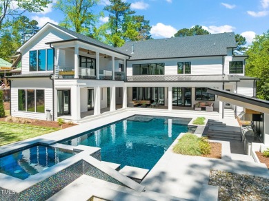 Step into elevated luxury in this custom-built masterpiece on North Ridge Country Club in North Carolina - for sale on GolfHomes.com, golf home, golf lot