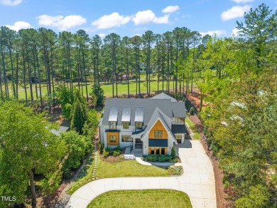 Step into elevated luxury in this custom-built masterpiece on North Ridge Country Club in North Carolina - for sale on GolfHomes.com, golf home, golf lot