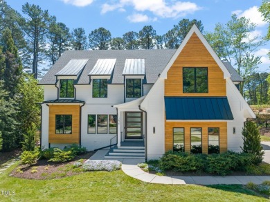 Step into elevated luxury in this custom-built masterpiece on North Ridge Country Club in North Carolina - for sale on GolfHomes.com, golf home, golf lot