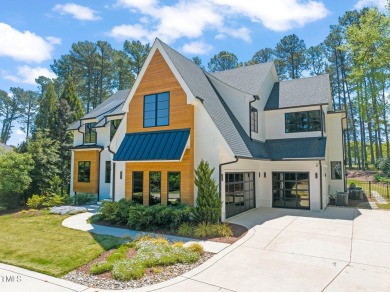 Step into elevated luxury in this custom-built masterpiece on North Ridge Country Club in North Carolina - for sale on GolfHomes.com, golf home, golf lot