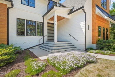 Step into elevated luxury in this custom-built masterpiece on North Ridge Country Club in North Carolina - for sale on GolfHomes.com, golf home, golf lot
