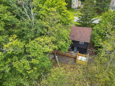 Welcome to this newly renovated mountain oasis at 1066 Knollwood on Pocono Farms Country Club in Pennsylvania - for sale on GolfHomes.com, golf home, golf lot