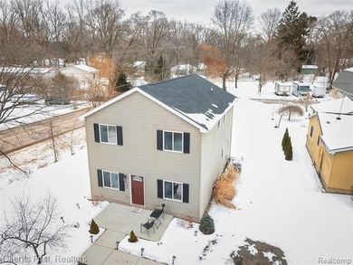 Welcome home to this fully remodeled and beautifully upgraded on Rush Lake Hills Golf Club in Michigan - for sale on GolfHomes.com, golf home, golf lot