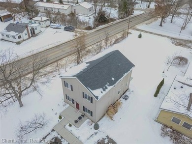 Welcome home to this fully remodeled and beautifully upgraded on Rush Lake Hills Golf Club in Michigan - for sale on GolfHomes.com, golf home, golf lot