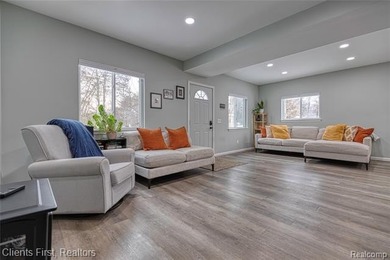 Welcome home to this fully remodeled and beautifully upgraded on Rush Lake Hills Golf Club in Michigan - for sale on GolfHomes.com, golf home, golf lot