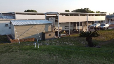 Oversized RV lot with 16 x 58 port with full hookups or build on Deer Creek RV Golf Resort in Florida - for sale on GolfHomes.com, golf home, golf lot