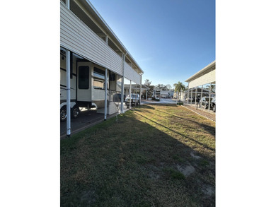 Oversized RV lot with 16 x 58 port with full hookups or build on Deer Creek RV Golf Resort in Florida - for sale on GolfHomes.com, golf home, golf lot