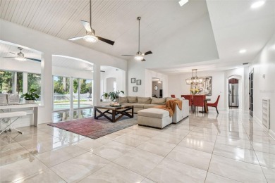 Welcome to your dream home in the exclusive Carrollwood Village on Carrollwood Country Club in Florida - for sale on GolfHomes.com, golf home, golf lot