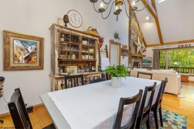 Welcome to 'Evening Shade', a charming, furnished cabin nestled on Alpine Lake Resort in West Virginia - for sale on GolfHomes.com, golf home, golf lot