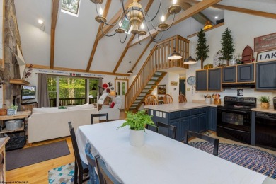 Welcome to 'Evening Shade', a charming, furnished cabin nestled on Alpine Lake Resort in West Virginia - for sale on GolfHomes.com, golf home, golf lot