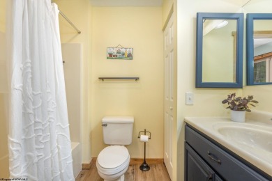 Welcome to 'Evening Shade', a charming, furnished cabin nestled on Alpine Lake Resort in West Virginia - for sale on GolfHomes.com, golf home, golf lot