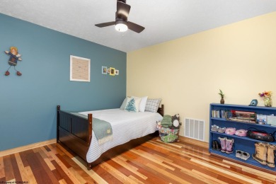 Welcome to 'Evening Shade', a charming, furnished cabin nestled on Alpine Lake Resort in West Virginia - for sale on GolfHomes.com, golf home, golf lot