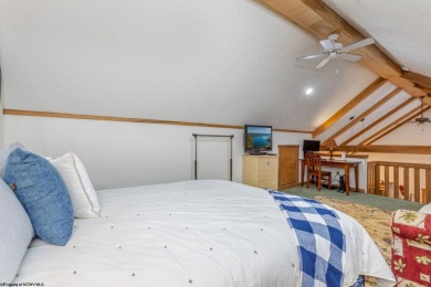 Welcome to 'Evening Shade', a charming, furnished cabin nestled on Alpine Lake Resort in West Virginia - for sale on GolfHomes.com, golf home, golf lot