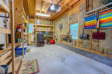 Welcome to 'Evening Shade', a charming, furnished cabin nestled on Alpine Lake Resort in West Virginia - for sale on GolfHomes.com, golf home, golf lot