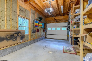 Welcome to 'Evening Shade', a charming, furnished cabin nestled on Alpine Lake Resort in West Virginia - for sale on GolfHomes.com, golf home, golf lot