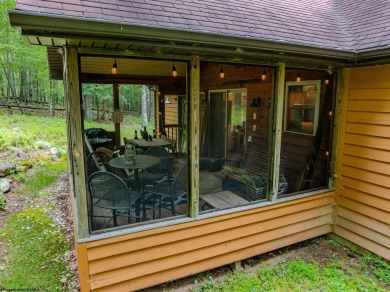 Welcome to 'Evening Shade', a charming, furnished cabin nestled on Alpine Lake Resort in West Virginia - for sale on GolfHomes.com, golf home, golf lot