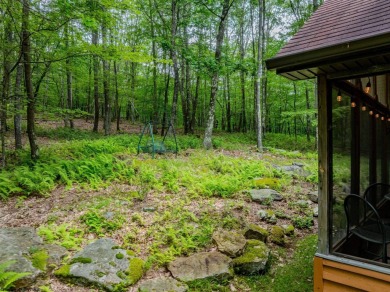 Welcome to 'Evening Shade', a charming, furnished cabin nestled on Alpine Lake Resort in West Virginia - for sale on GolfHomes.com, golf home, golf lot