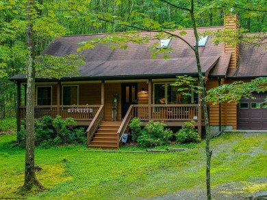 Welcome to 'Evening Shade', a charming, furnished cabin nestled on Alpine Lake Resort in West Virginia - for sale on GolfHomes.com, golf home, golf lot