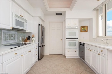 St Raphael #1907 has 10' ceilings and spectacular views of the on Club at Pelican Bay Golf Course in Florida - for sale on GolfHomes.com, golf home, golf lot