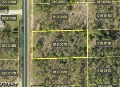 Discover a rare gem in Lehigh Acres, Southwest Florida-a prime on Lehigh Resort Club in Florida - for sale on GolfHomes.com, golf home, golf lot